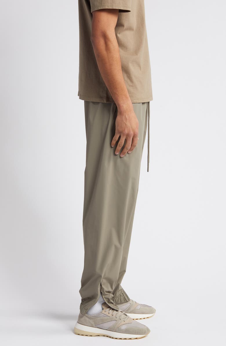Fear of God Essentials Stretch Nylon Track Pants, Alternate, color, 