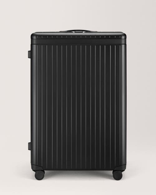 Carl Friedrik The Large Check-in Suitcase In Black