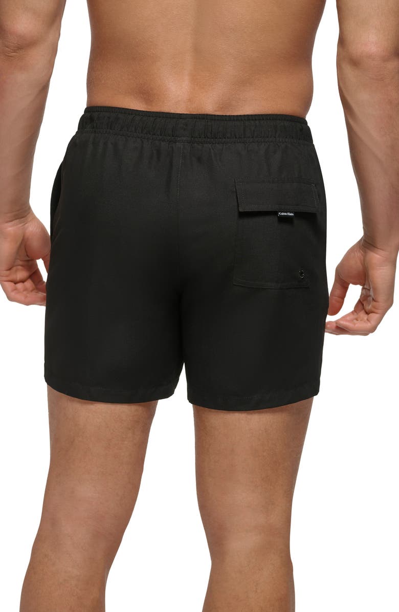 Calvin Klein Solid Core Swim Trunks, Alternate, color, 