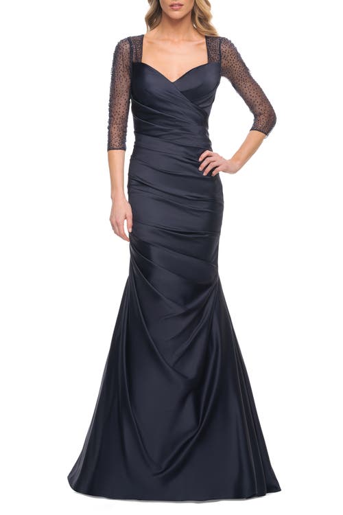 La Femme Mermaid Satin Pleated Gown with Illusion Beaded Sleeves in Navy 