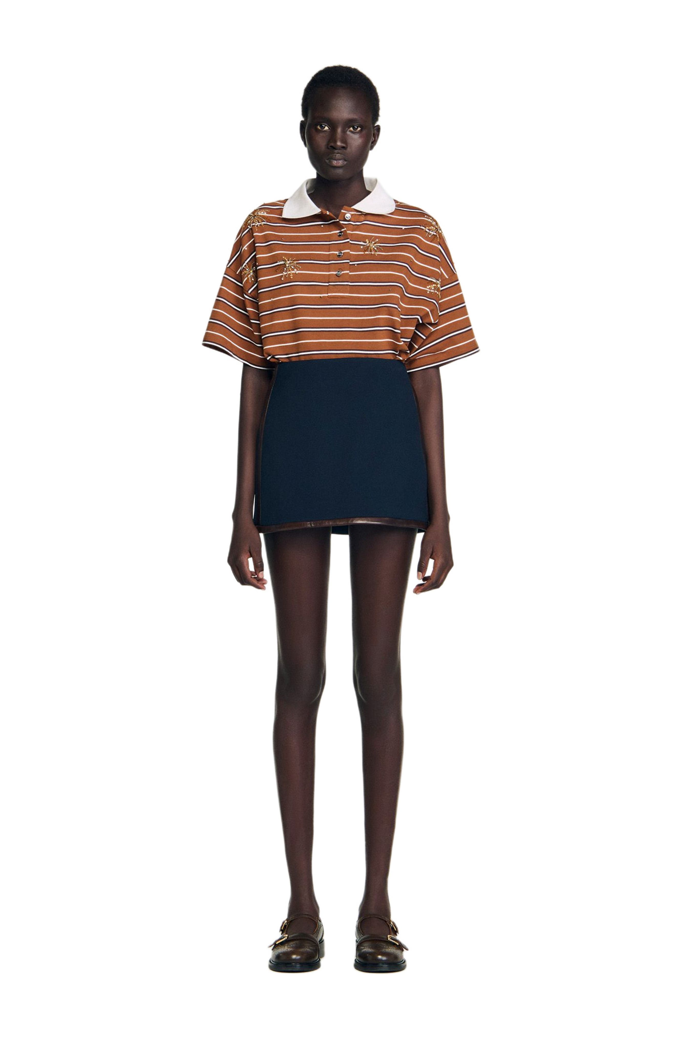 Short skirt with leather bands - image 2