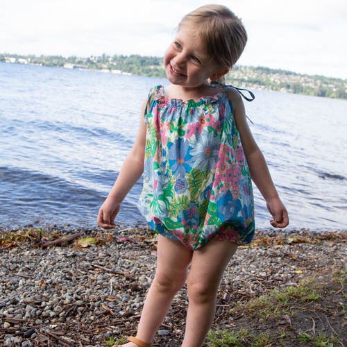 Beet World Open-tie Baby Strap Romper In Blue Floral
