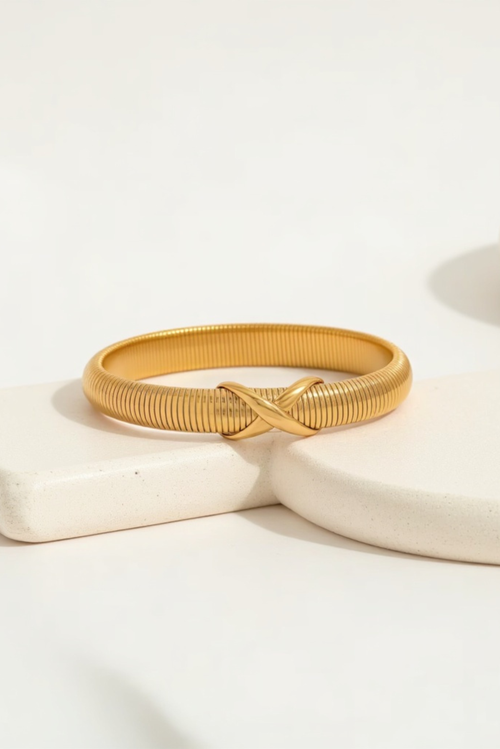 Akalia Stylish Waterproof Love Twist Bracelet With Gold Plating In Gold