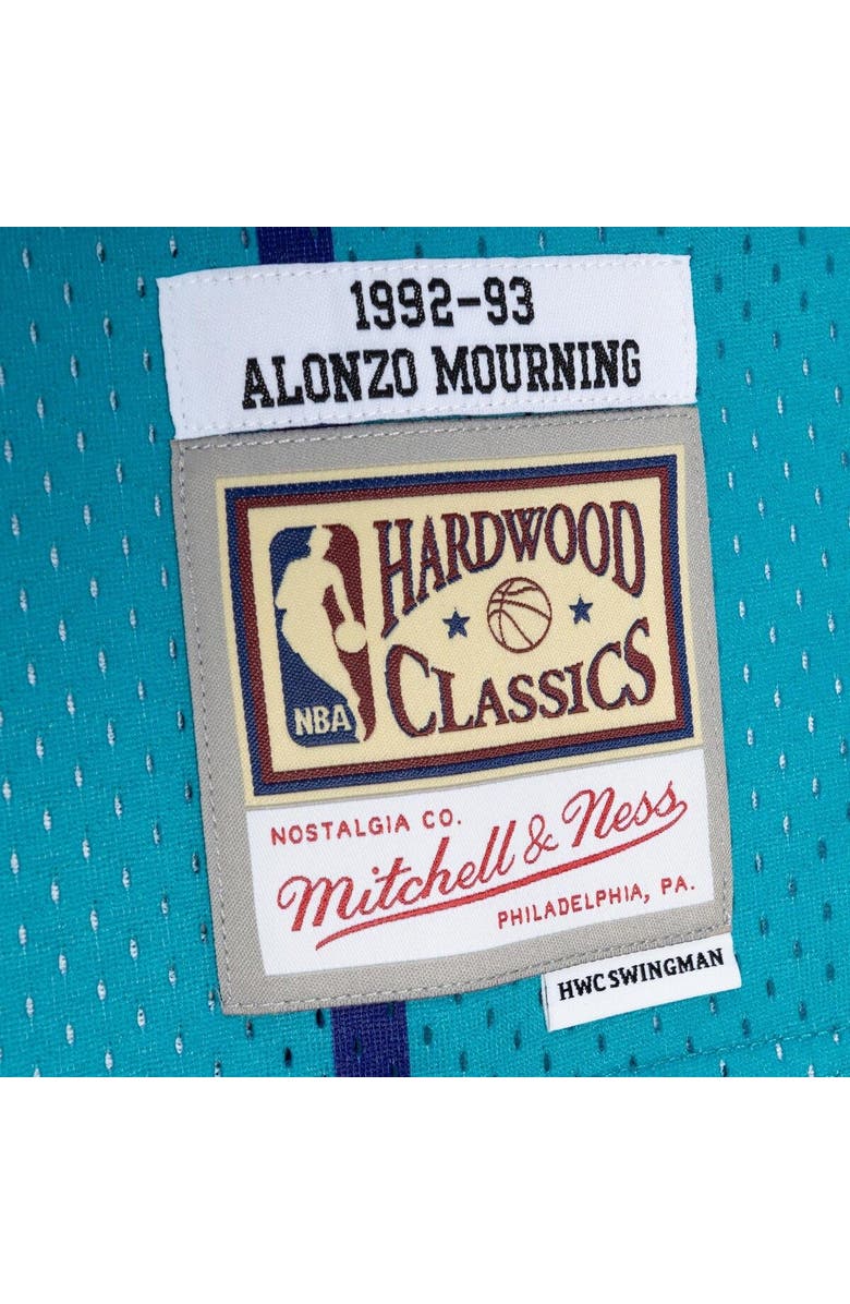 Mitchell & Ness Men's Mitchell & Ness Alonzo Mourning Teal/Purple Charlotte Hornets Hardwood Classics 1992/93 Split Swingman Jersey, Alternate, color, 
