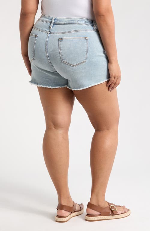 Shop Vigoss Marley Distressed Raw Edge Denim Shorts In Light Wash