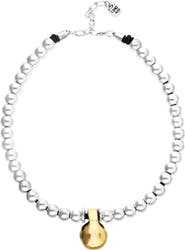 UNODE50 Necklace of medium spheres plated in sterling silver and large dial plated in 18k gold
