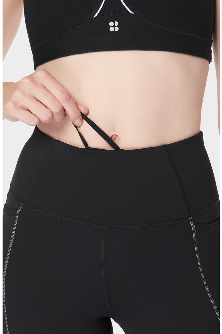 Therma Boost Pocketed 7/8 Running Leggings, Alternate, color, BLACK