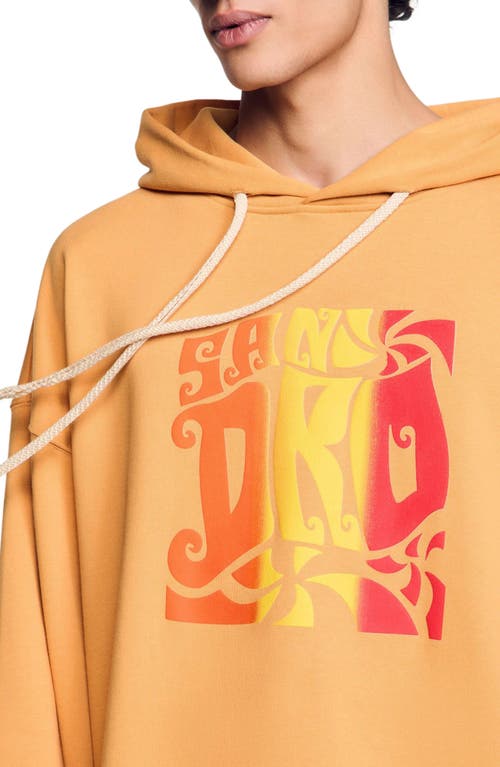 Sandro Graphic Oversized Pullover Hoodie In Mandarin.