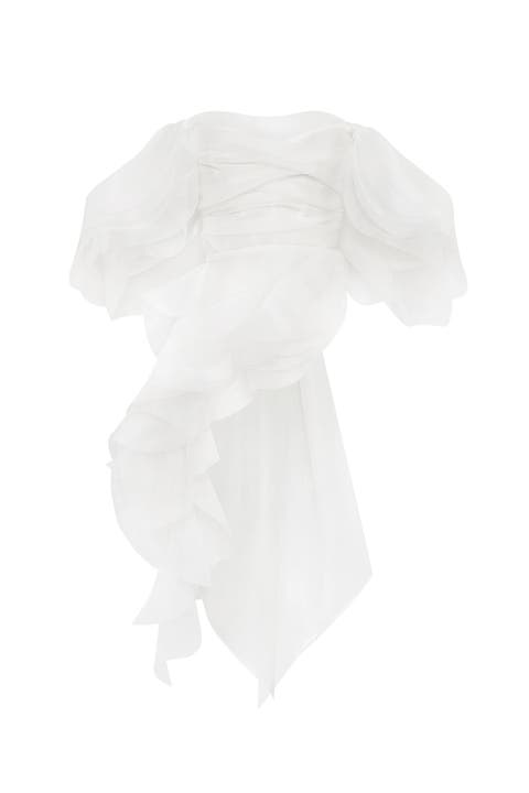 Dreamy off-shoulder blouse with meringue flounces