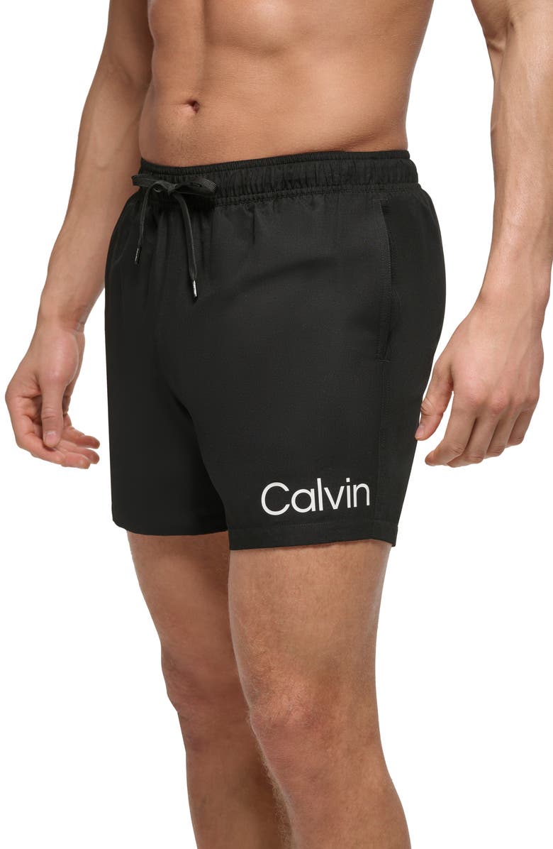 Calvin Klein Solid Core Swim Trunks, Alternate, color, 