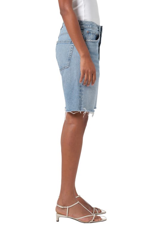 Shop Agolde '90s Long Cutoff Denim Shorts In Force