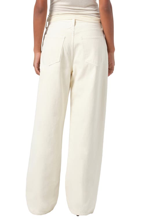 Shop Agolde Low Slung Baggy Jeans In Solar