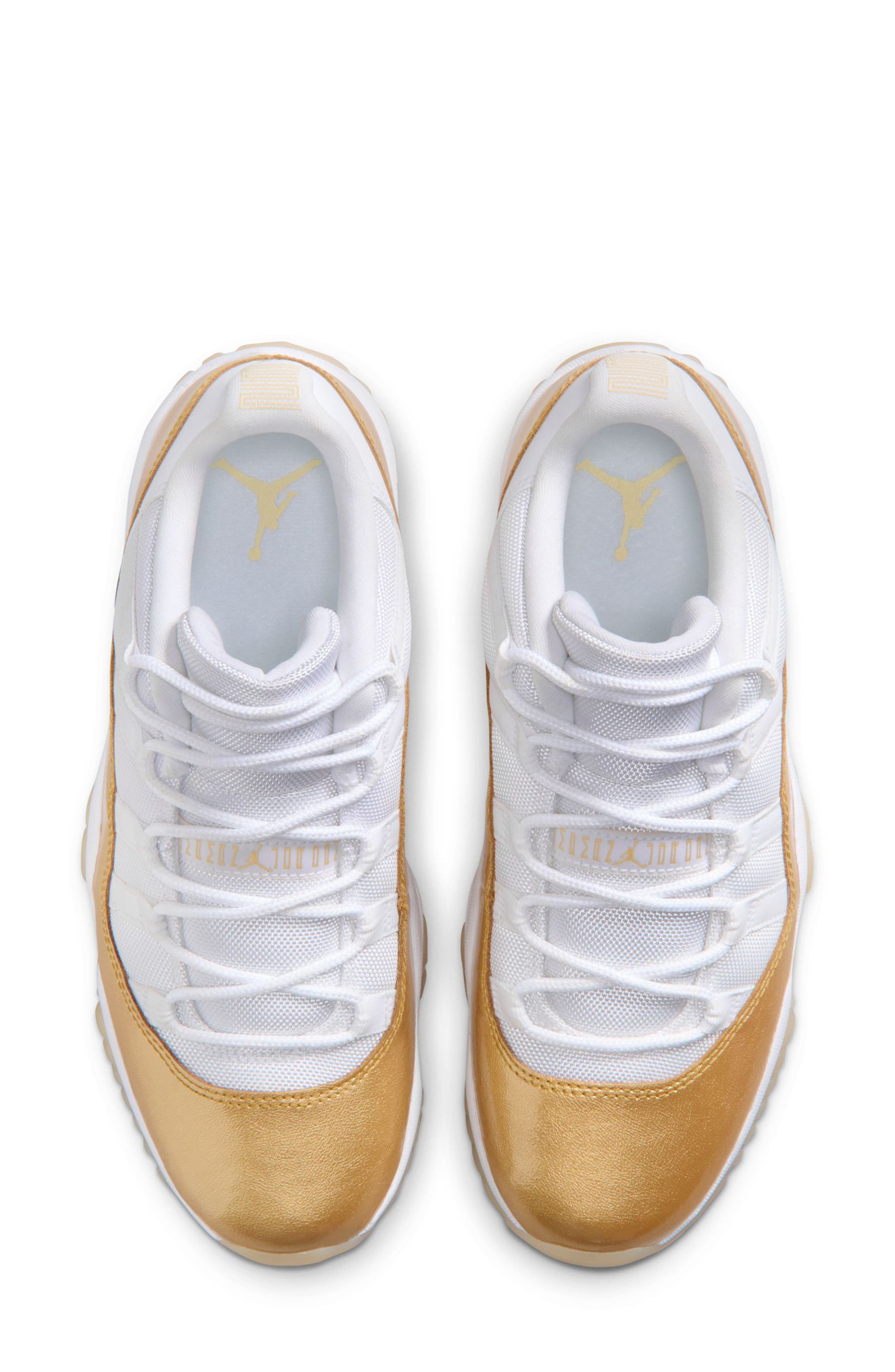Jordan Air Jordan 11 Retro Low Basketball Sneaker, Alternate, color, White/ Gold