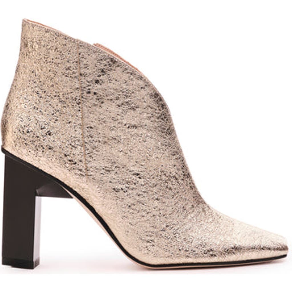 Tiannia Barnes Sancy Ankle Bootie In Gold