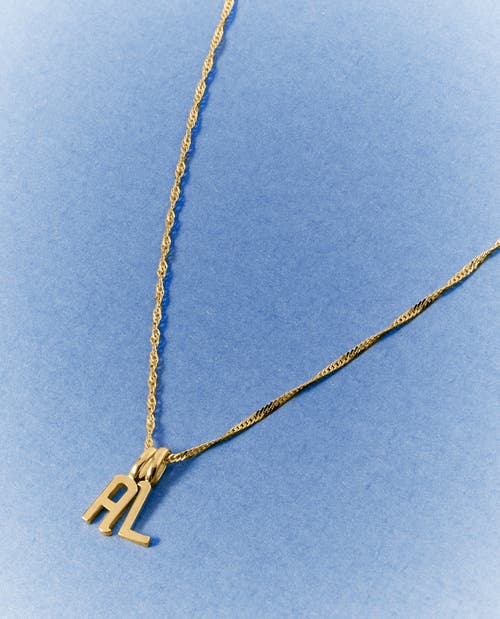 Edge Of Ember Solid Gold Initial Necklace In Red