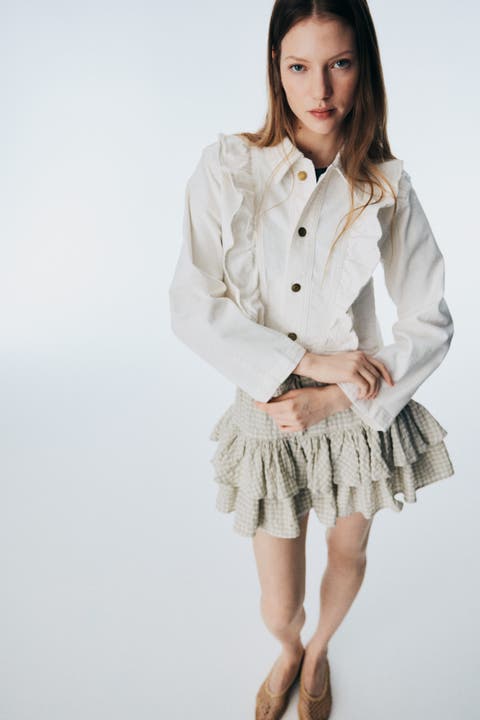 Ruffle-trimmed denim jacket
