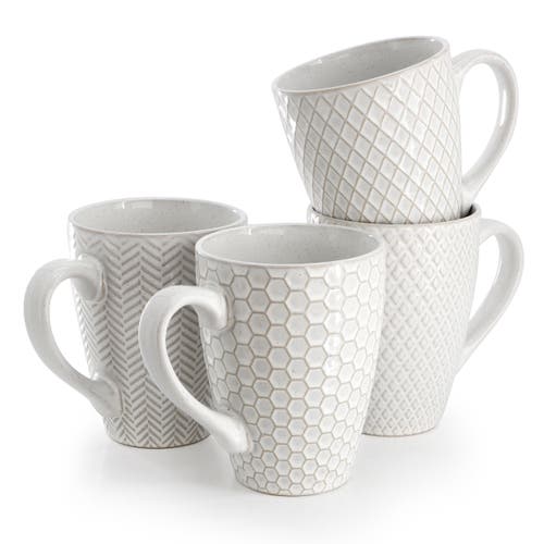 Gibson Elite Earlhart 4 Piece 16 Ounce Stoneware Assorted Pattern Mug Set In White