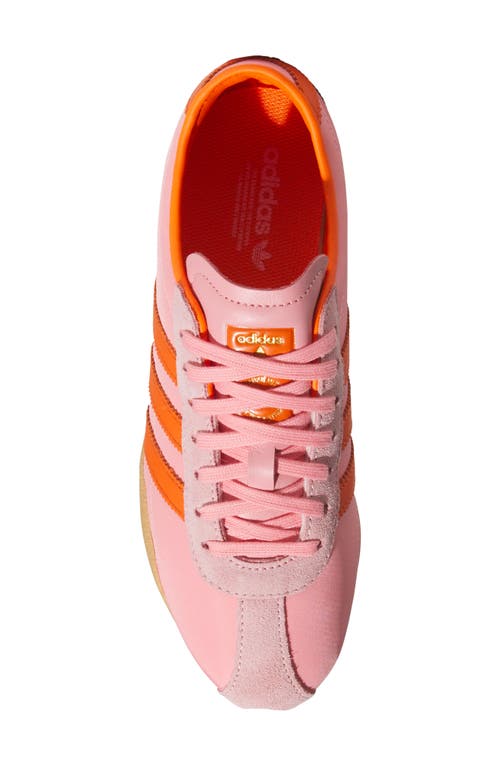 Shop Adidas Originals Adidas Tokyo Low Top Suede Sneaker In Pink Spark/orange/gold