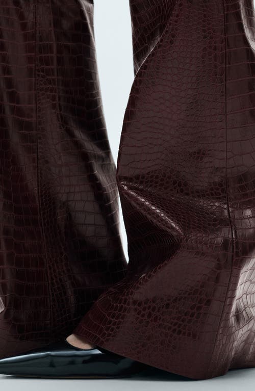 Shop Mango Snake Embossed Faux Leather Flare Pants In Burgundy