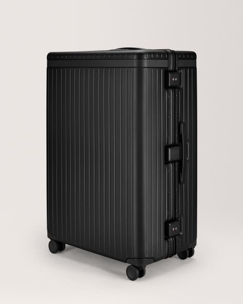 Carl Friedrik The Large Check-in Suitcase In Black
