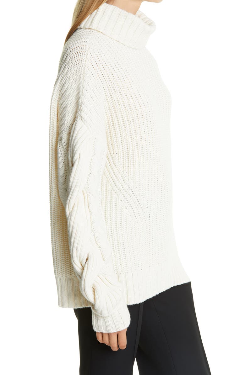 Simkhai Jonathan Simkhai Aubrey Traveling Cold Shoulder Cable Knit Turtleneck Sweater, Alternate, color, 