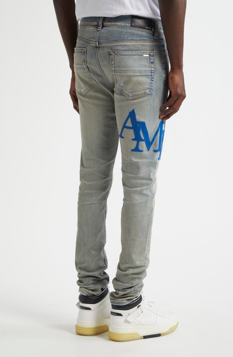 AMIRI Staggered Logo Skinny Jeans, Alternate, color, 