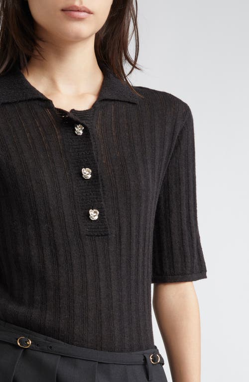 Eenk Rose Button Polo Sweater In Black