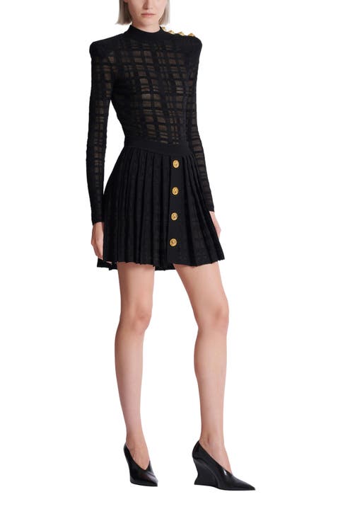 Short pleated skirt in plaid knit