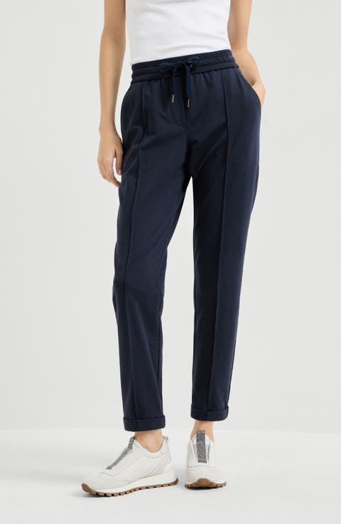 Track trousers with monili