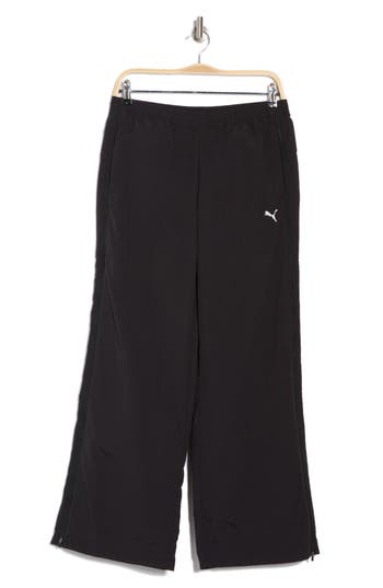 Puma Dare To Relaxed Woven Zip-off Pants In Black