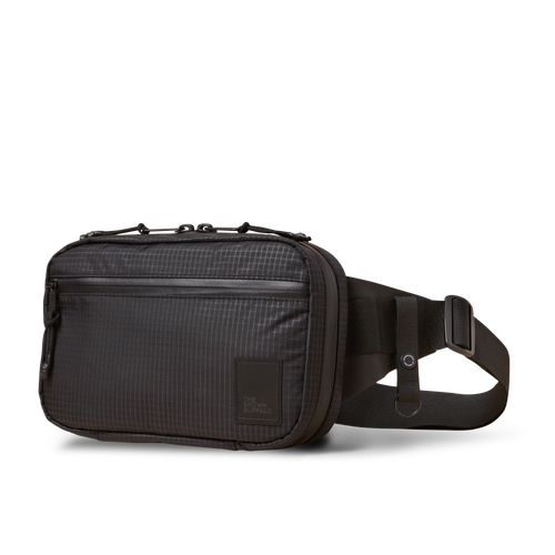 The Brown Buffalo Concealsling Backpack in Black-Grid at Nordstrom
