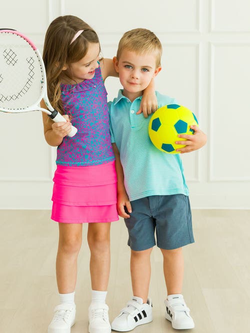 Rufflebutts Girls Active Skort In Neon Magenta