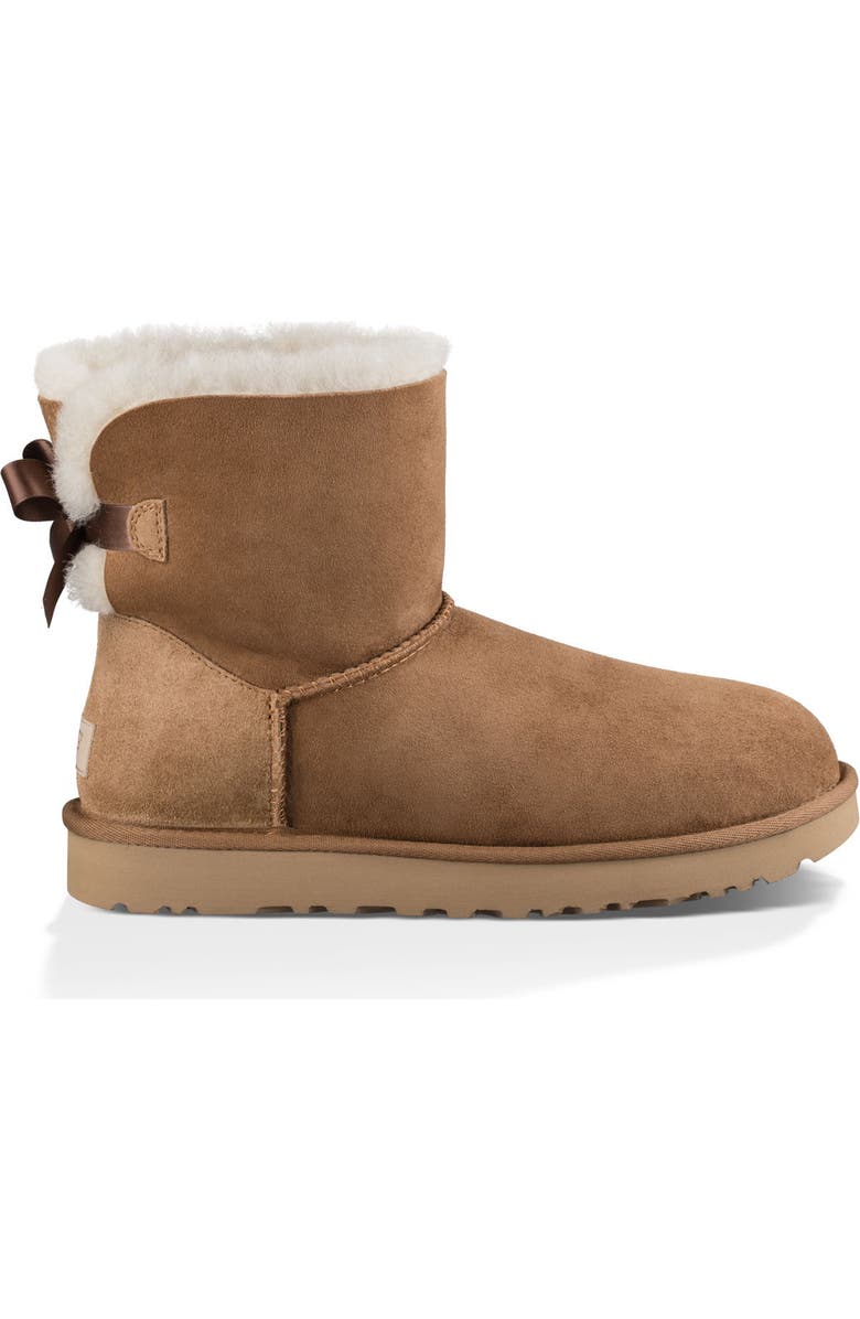 UGG<sup>®</sup> Mini Bailey Bow II Genuine Shearling Bootie, Alternate, color, Chestnut Suede