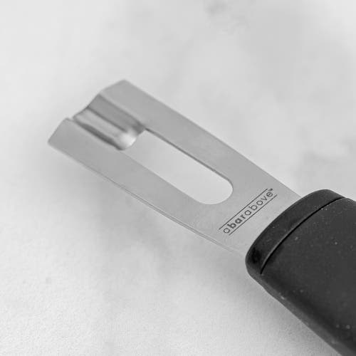 A Bar Above Stainless Steel Channel Knife With Black Handle In Black