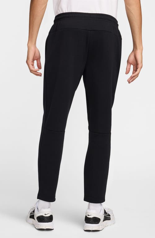 Nike Primary Fleece Dri-fit Uv Tapered Performance Pants In Black