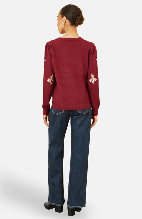 Yumi Sequin Applique Bow Sweater In Burgundy