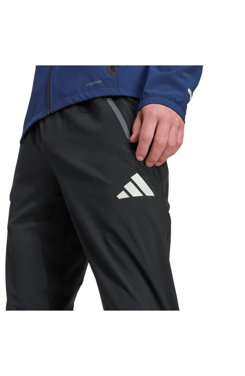adidas Men's adidas Black Arsenal 2025/26 Tiro Vis Tech Travel Pants, Alternate, color,