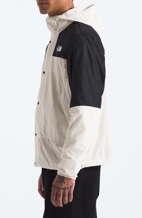 Shop The North Face Mountain Wind Jacket In White Dune/tnf Black