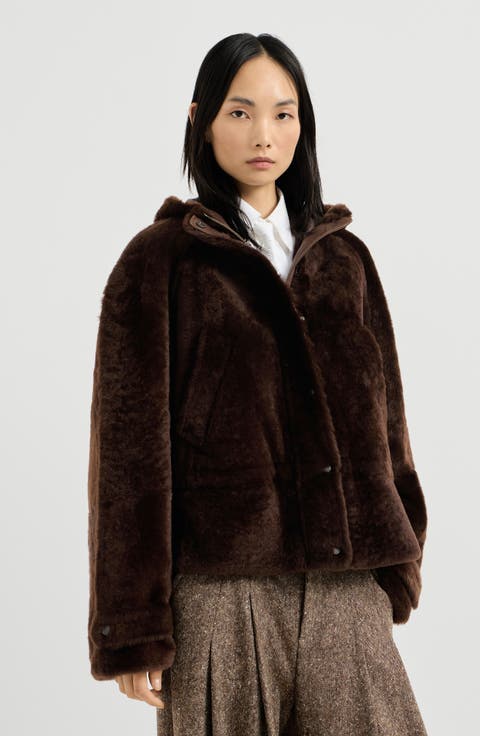 Shearling outerwear jacket with shiny zipper pull