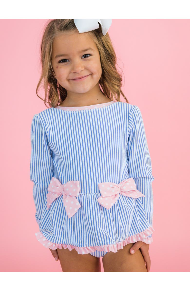 RuffleButts UPF50+ Seersucker Long Sleeve One Piece Bow Peplum Rash Guard Swimsuit, Alternate, color, Periwinkle Blue Seersucker