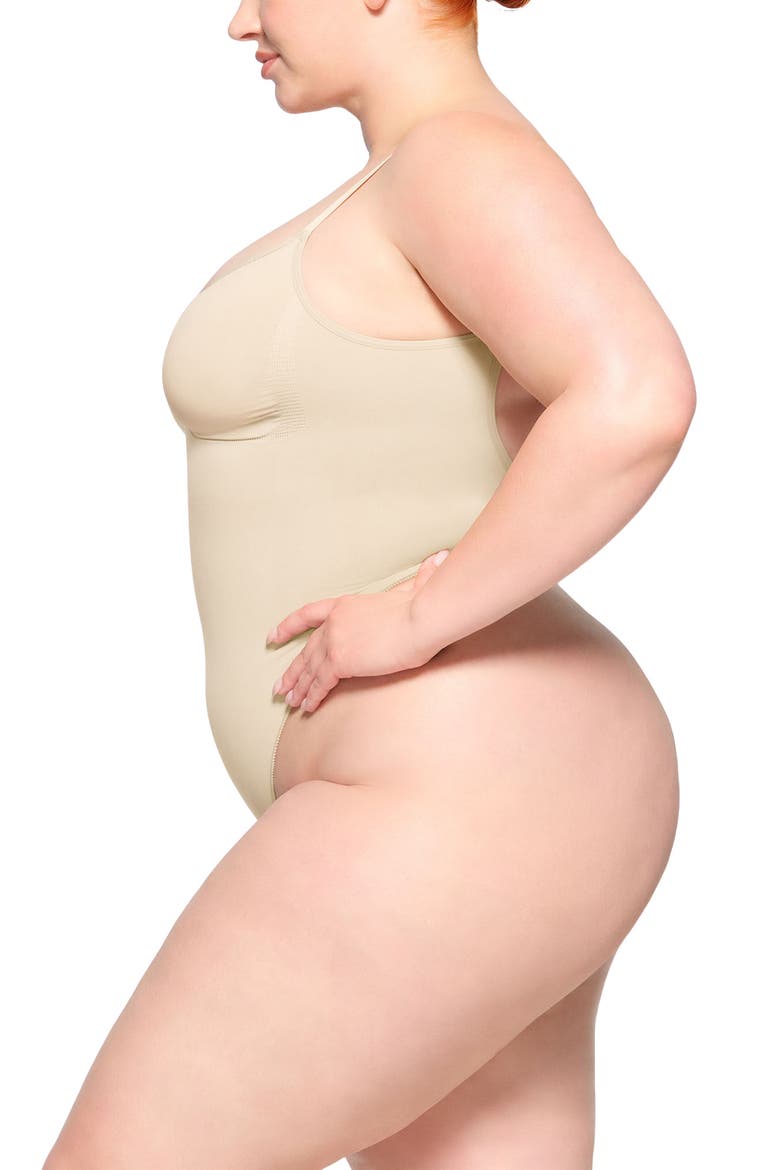 Seamless Sculpt Low Back Thong Bodysuit, Alternate, color, SAND