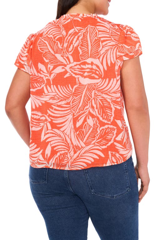 Cece Smocked Tie Neck Flutter Sleeve Top In Orange