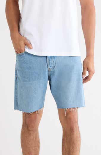 The Relaxed Raw Hem Denim Shorts