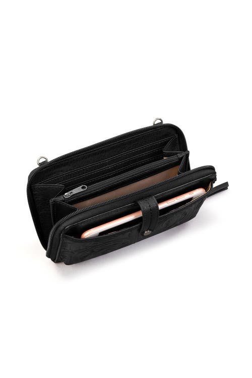 The Sak Iris Smartphone Crossbody In Black Leaf Emboss