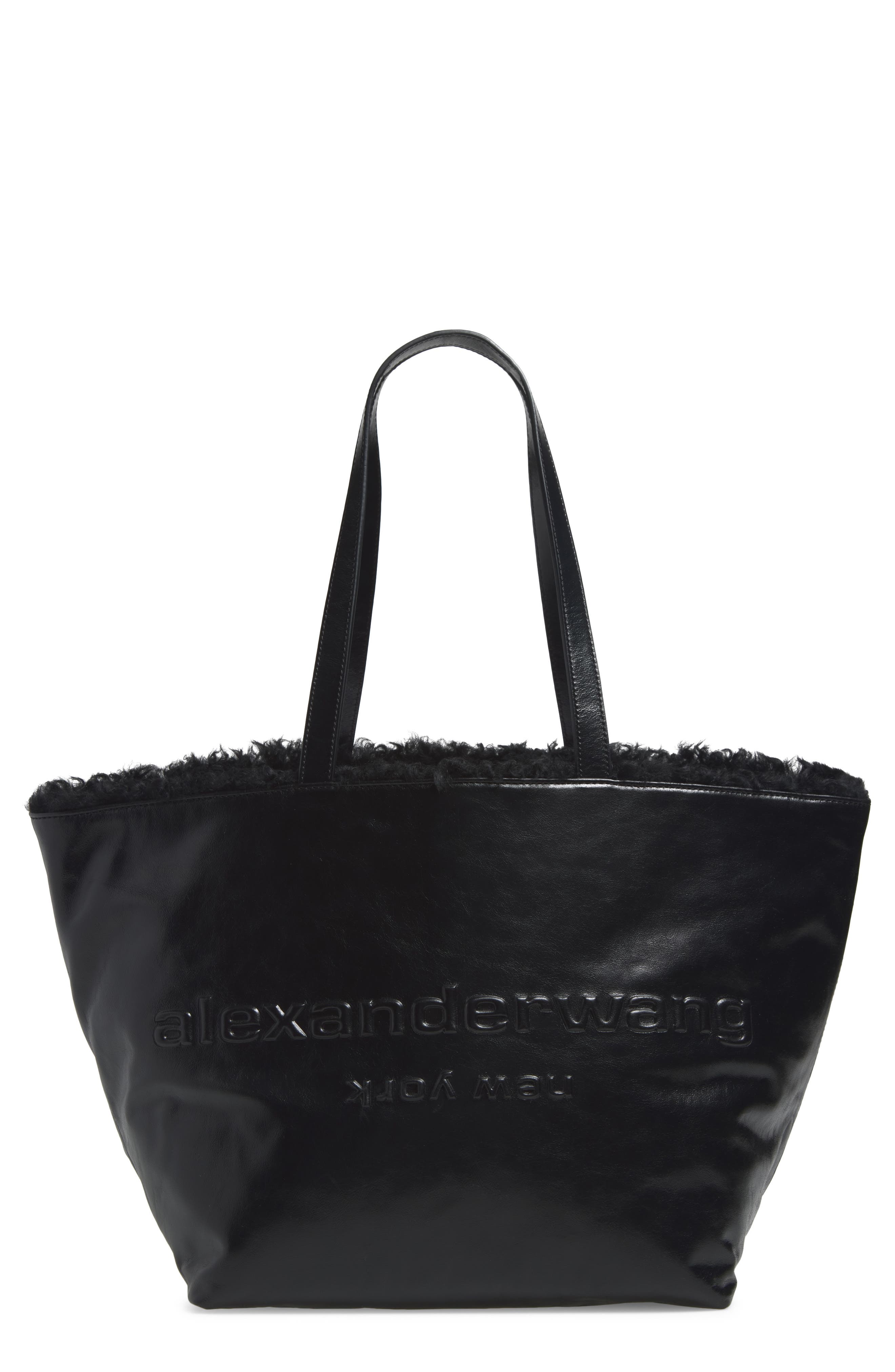 Punch Genuine Shearling Lined Leather Tote, Main, color, BLACK