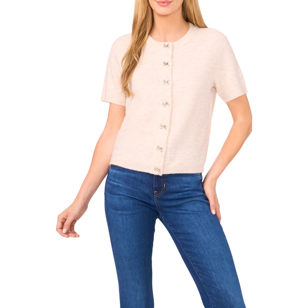 Cece Short Sleeve Bow Button Cardigan In Pink