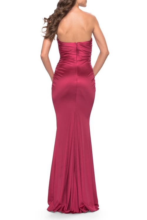 La Femme Chic Strapless Liquid Jersey Gown With Ruching In Deep Red