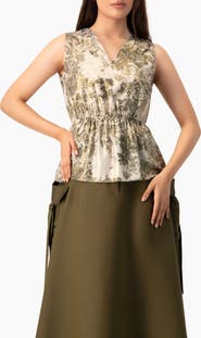 IVONNE Sleeveless Peplum Blouse in Abstract Botanical Print
