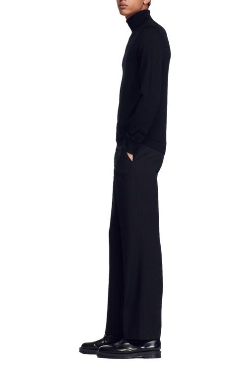 Sandro Roll Neck Wool Sweater In Black