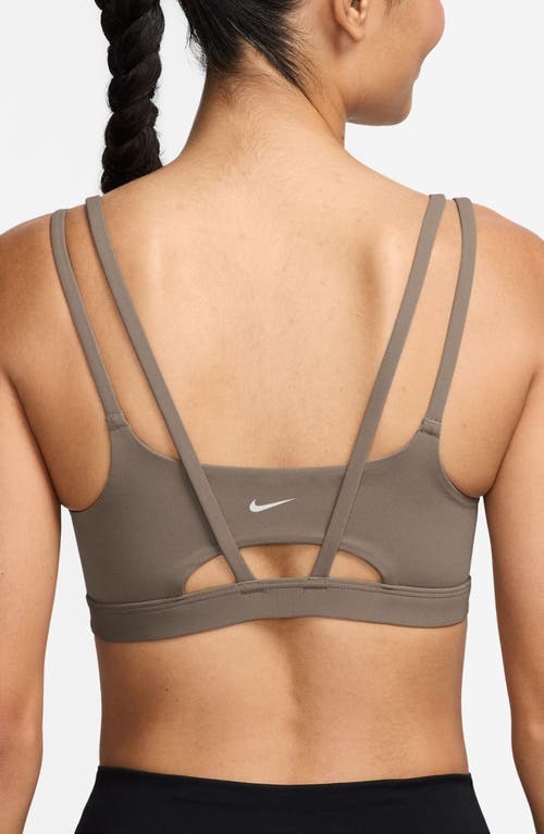 Shop Nike Zenvy Strappy Light-support Padded Sports Bra In Mink Brown/white
